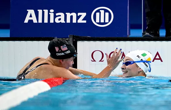 Paris , France - 3 September 2024; Róisín Ní Riain of Ireland, right, is congratulated by Olivia Chambers of USA after winning bronze in the Women's 200m Individual Medley SM13 Final on day six of the Paris 2024 Paralympic Games at La Defense Arena in Paris, France. (Photo By Ramsey Cardy/Sportsfile via Getty Images)