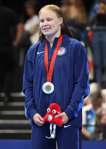NANTERRE, FRANCE - SEPTEMBER 03: Silver medalist Olivia Chambers of Team United States poses for a photo during the Para Swimming Women's 200m Individual Medley SM13 Medal Ceremony on day six of the Paris 2024 Summer Paralympic Games at Paris La Defense Arena on September 03, 2024 in Nanterre, France. (Photo by Sean M. Haffey/Getty Images)