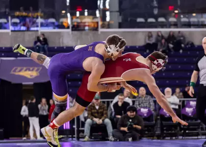 UNI wrestling rallies for senior day win over Wisconsin Image