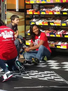 UNLV track & field head coach Yvonne Wade and some of her Rebels volunteered with the Goodie Two Shoes Foundation Thursday.