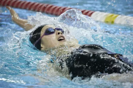Jessica Wong won one event for the Rebels on Friday night against the Cougars.