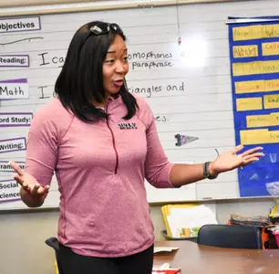 UNLV track & field head coach Yvonne Wade spoke with fourth graders at Harmon Elementary Tuesday.
