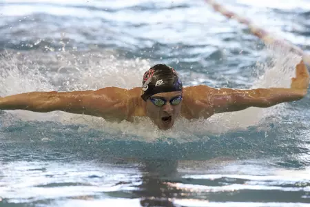 DIllon Virva took third in the 100 fly for the Rebels on Friday night.