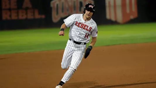 Higgins rounding third base