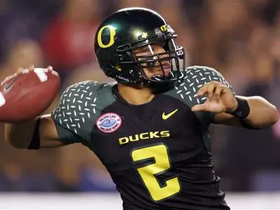 Jeremiah Masoli looks to throw at the Holiday Bowl