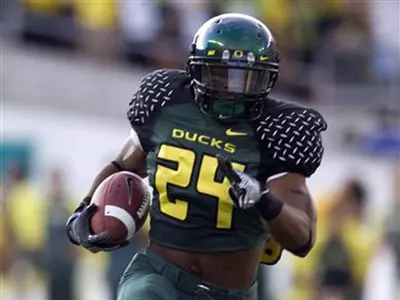 Johnson runs the ball against Washington