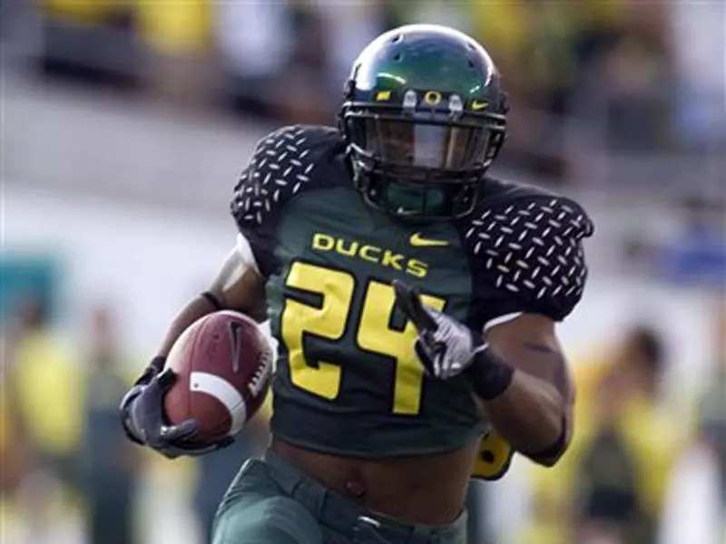 Johnson runs the ball against Washington