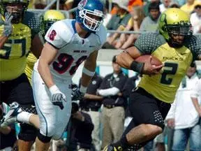 Jeremiah Masoli runs against Boise State