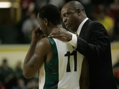 Malcolm Armstead and head coach Ernie Kent