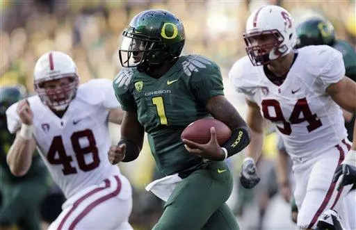 Oregon quarterback Darron Thomas (1)