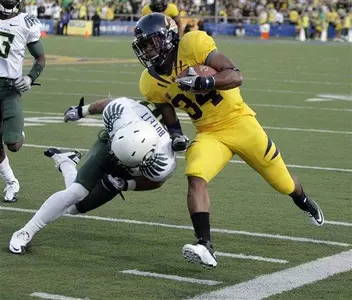 California running back Shane Vereen (34) is stopped by safety John Boyett (20)