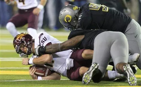 Ricky Heimuli tackles Arizona State quarterback Brock Osweiler