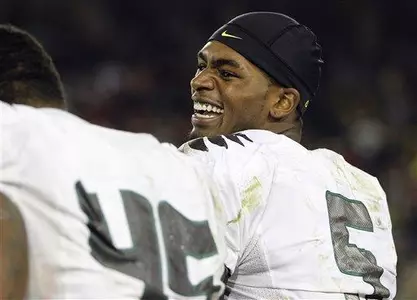 Oregon quarterback Darron Thomas, smiles