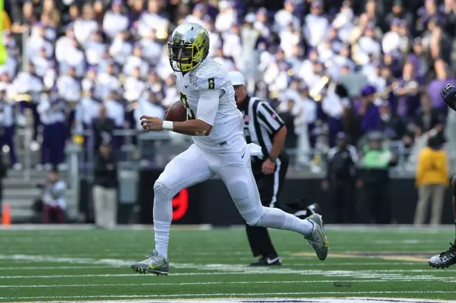 Mariota wows Huskies and Heisman voters