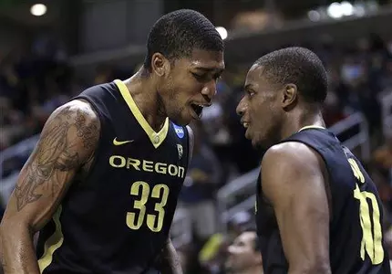 Oregon's Carlos Emory, left, and