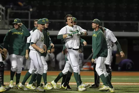 Ryon Healy and team. Oregon vs. Wash. Copyright 2013 Eric Evans.