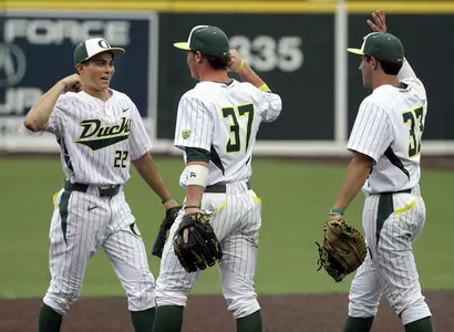 Austin Grebeck (22), Mitchell Tolman (37) and A.J. Balta (33) celebrate