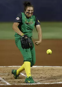 Cheridan Hawkins pitches in the first inning during the WCWS