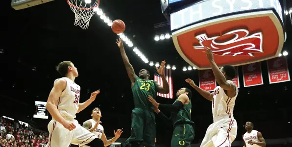 Oregon's Elgin Cook (23) takes a shot