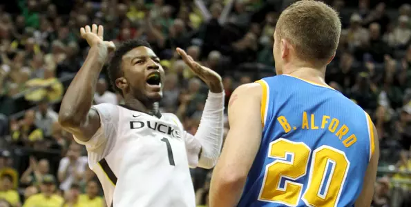 Oregon's Jordan Bell, left, reacts to