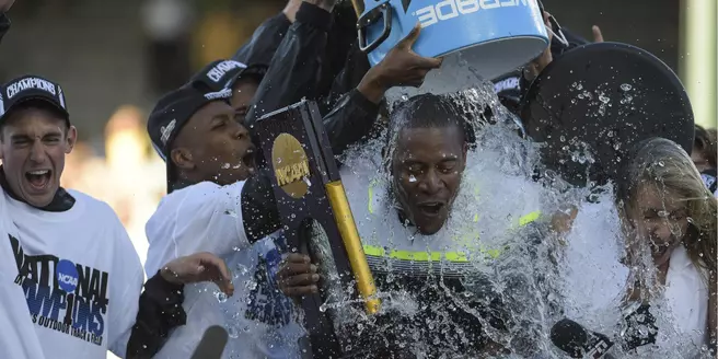 Johnson, Powell Tabbed with Coaches Honors