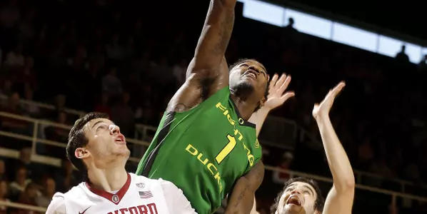 Oregon's Jordan Bell, center, reaches