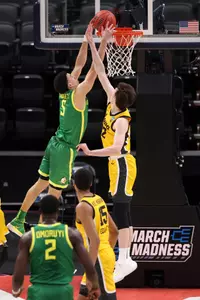 INDIANAPOLIS, IN - MARCH 22: Iowa Hawkeyes against the Oregon Ducks in the second round of the 2021 NCAA Division I Men's Basketball Tournament held at Bankers Life Fieldhouse on March 22, 2021 in Indianapolis, Indiana. (Photo by Jack Dempsey/NCAA Photos via Getty Images