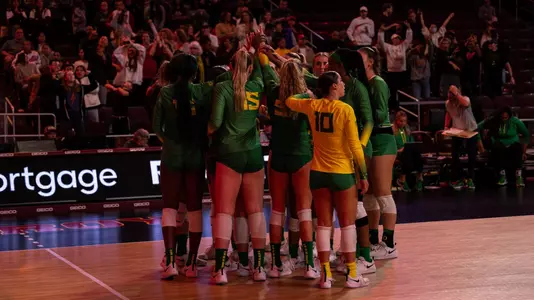 Team huddle at USC - Oct. 14