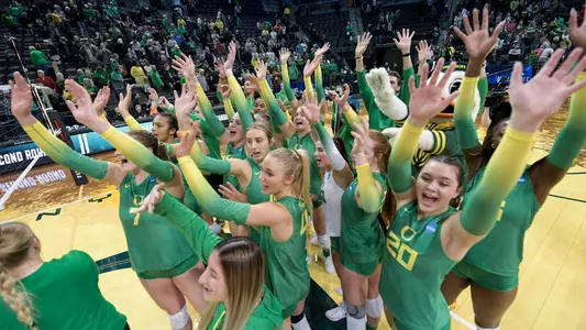 Oregon team celebration vs Arkansas - Dec. 3
