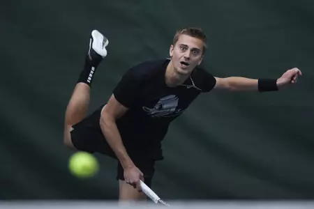 The Oregon Ducks take on the Wisconsin Badgers at The Student Tennis Center in Eugene, Oregon on February 25, 2022 (Isaac Wasserman/ Eric Evans Photography)