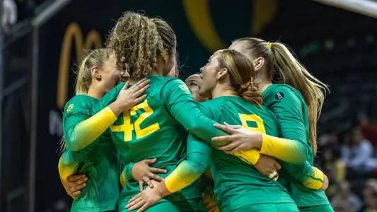 Team huddle celebration vs WSU