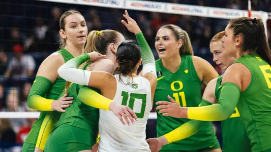 Team huddle celebration at Arizona