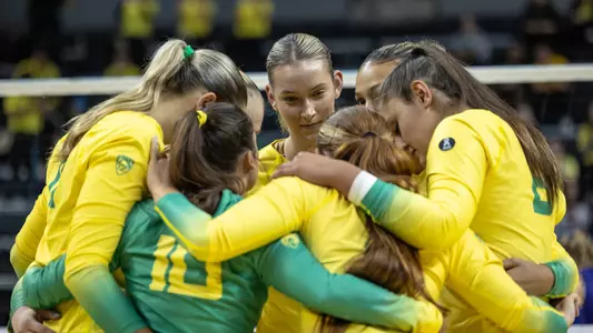 McGhee, team pre-match huddle vs UW - Sept. 29