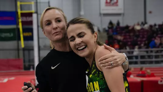 Maddy Elmore with assistant coach Shalane Flanagan, indoor 3K UO record