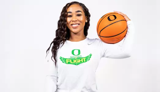Minyon Moore poses with a basketball for a Women In Flight photoshoot