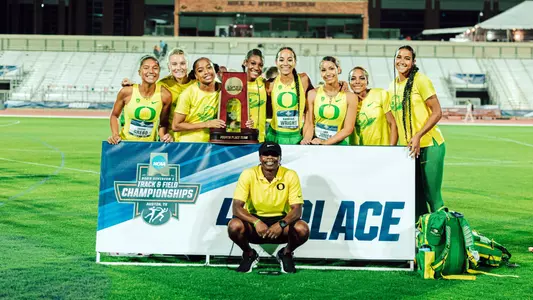 Adeniji with UO sprinters at NCAAs