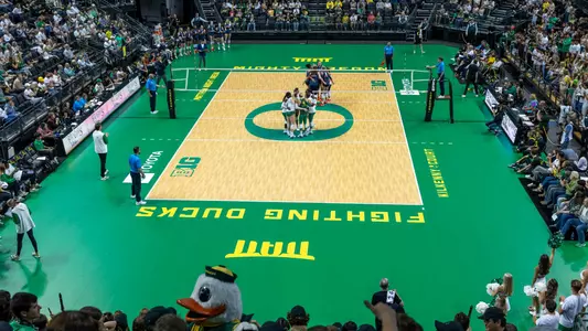 Team huddles at MKA vs Illinois (Sept. 27)