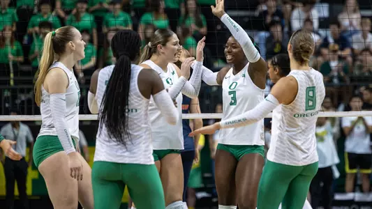 Team celebration, huddle vs Illinois - Sept. 27