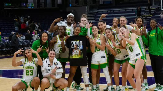 Deja Kelly 2,000 Points Postgame Team Jube