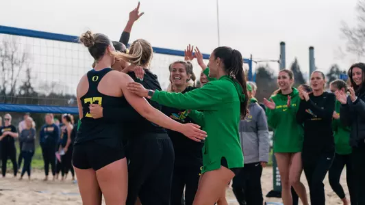 Team celebration vs Corban - March 21