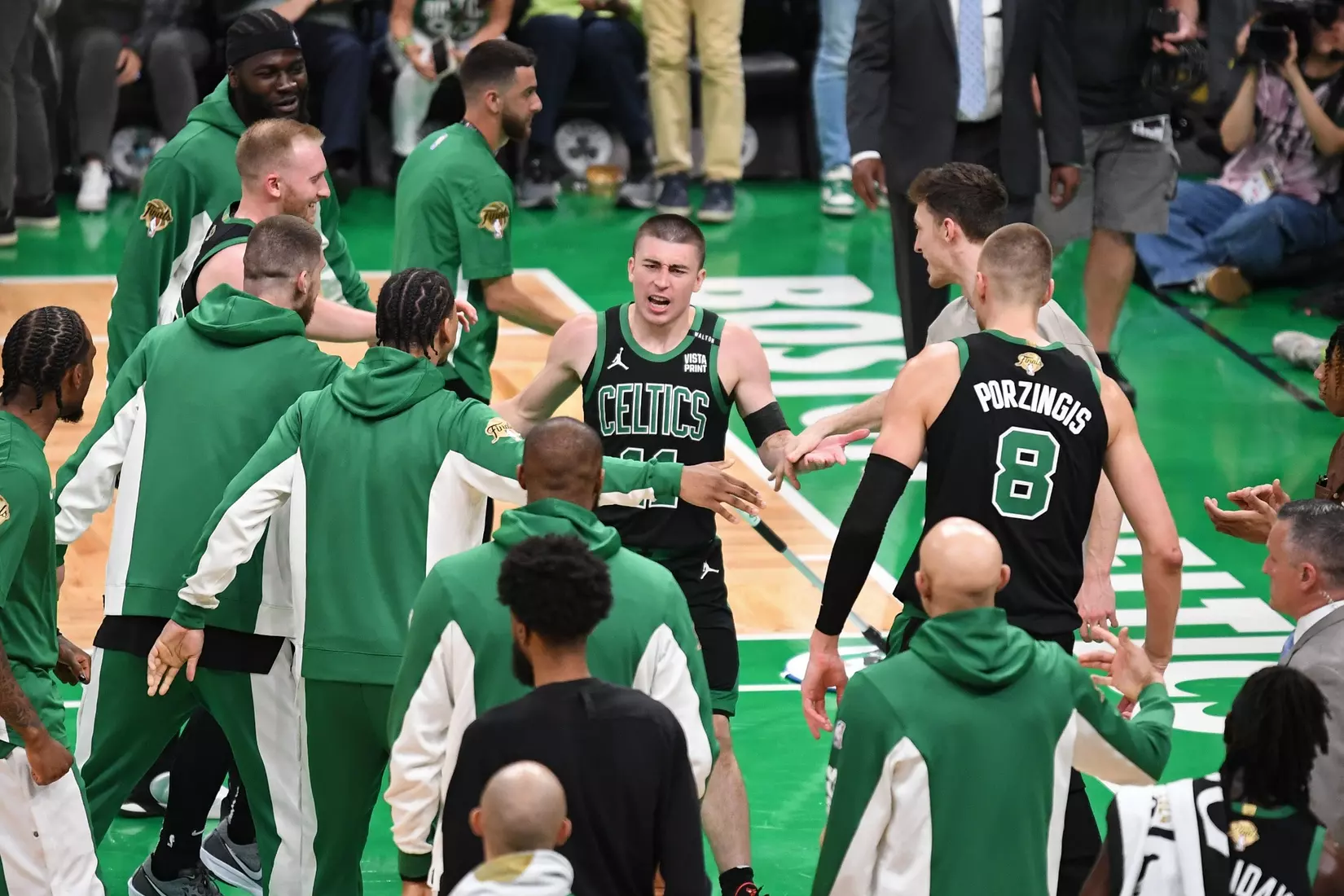 BOSTON, MA - JUNE 9: Payton Pritchard #11 of the Boston Celtics celebrates three point basket during the game against the Dallas Mavericks during Game 2 of the 2024 NBA Finals on June 9, 2024 at the TD Garden in Boston, Massachusetts. NOTE TO USER: User expressly acknowledges and agrees that, by downloading and or using this photograph, User is consenting to the terms and conditions of the Getty Images License Agreement. Mandatory Copyright Notice: Copyright 2024 NBAE  (Photo by China Wong/NBAE via Getty Images)