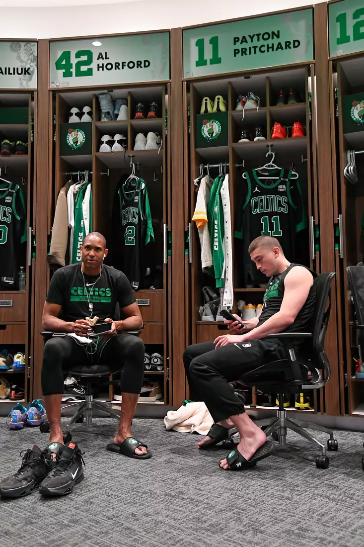 BOSTON, MA - JUNE 9: Al Horford #42 of the Boston Celtics and Payton Pritchard #11 of the Boston Celtics looks on before the game against the Dallas Mavericks during Game 2 of the 2024 NBA Finals on June 9, 2024 at the TD Garden in Boston, Massachusetts. NOTE TO USER: User expressly acknowledges and agrees that, by downloading and or using this photograph, User is consenting to the terms and conditions of the Getty Images License Agreement. Mandatory Copyright Notice: Copyright 2024 NBAE  (Photo by Brian Babineau/NBAE via Getty Images)