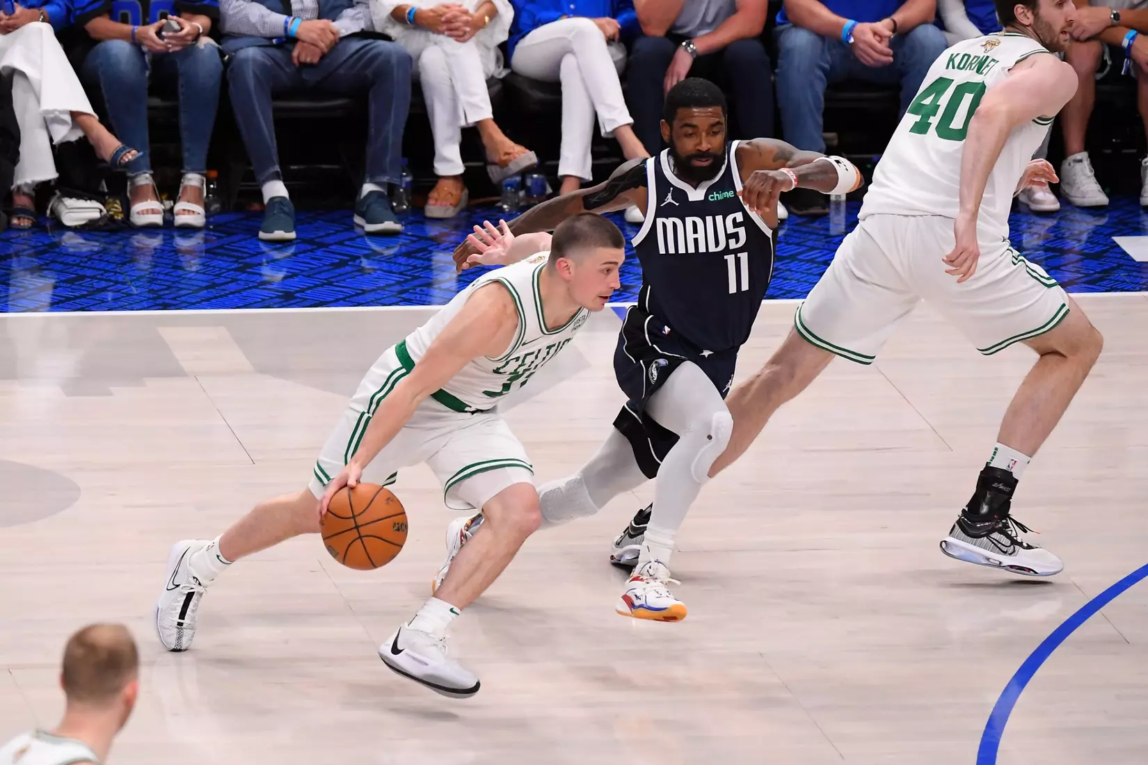 DALLAS, TX - JUNE 14: Payton Pritchard #11 of the Boston Celtics handles the ball during the game against the Dallas Mavericks during Game 4 of the 2024 NBA Finals on June 14, 2024 at the American Airlines Center in Dallas, Texas. NOTE TO USER: User expressly acknowledges and agrees that, by downloading and or using this photograph, User is consenting to the terms and conditions of the Getty Images License Agreement. Mandatory Copyright Notice: Copyright 2024 NBAE (Photo by Brian Babineau/NBAE via Getty Images)