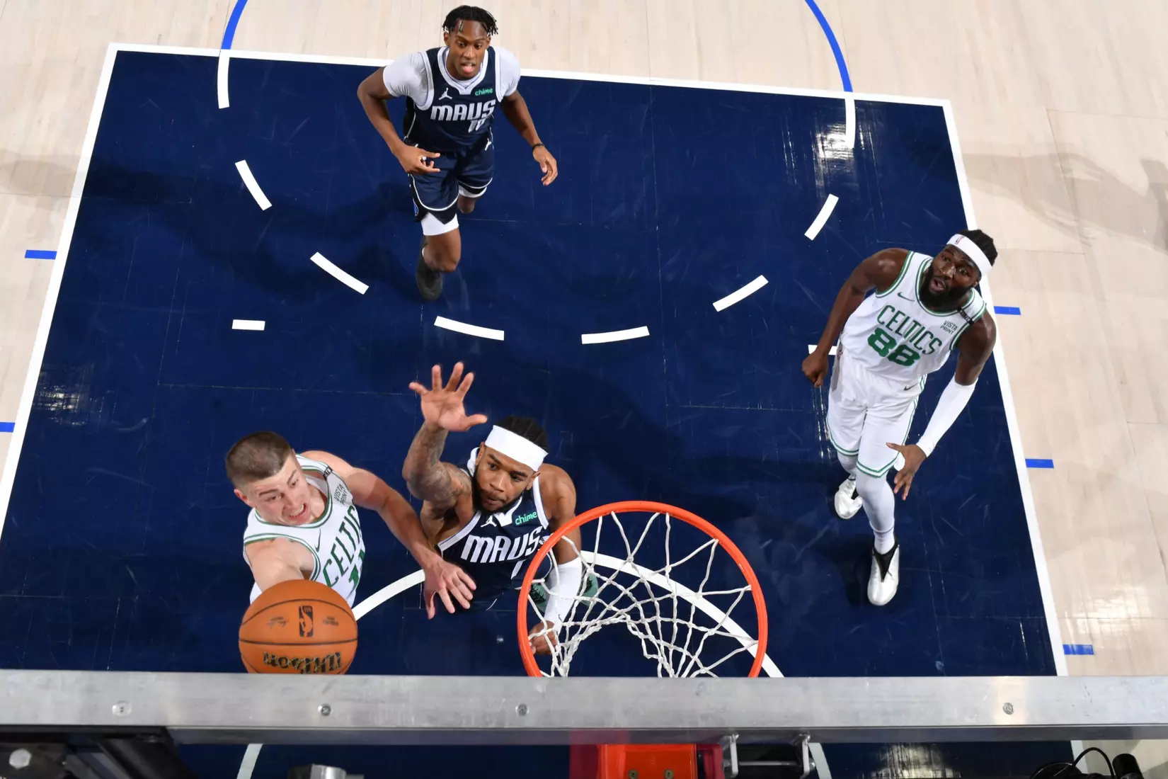DALLAS, TX - JUNE 14: Payton Pritchard #11 of the Boston Celtics drives to the basket during the game against the Dallas Mavericks during Game 4 of the 2024 NBA Finals on June 14, 2024 at the American Airlines Center in Dallas, Texas. NOTE TO USER: User expressly acknowledges and agrees that, by downloading and or using this photograph, User is consenting to the terms and conditions of the Getty Images License Agreement. Mandatory Copyright Notice: Copyright 2024 NBAE (Photo by Jesse D. Garrabrant/NBAE via Getty Images)