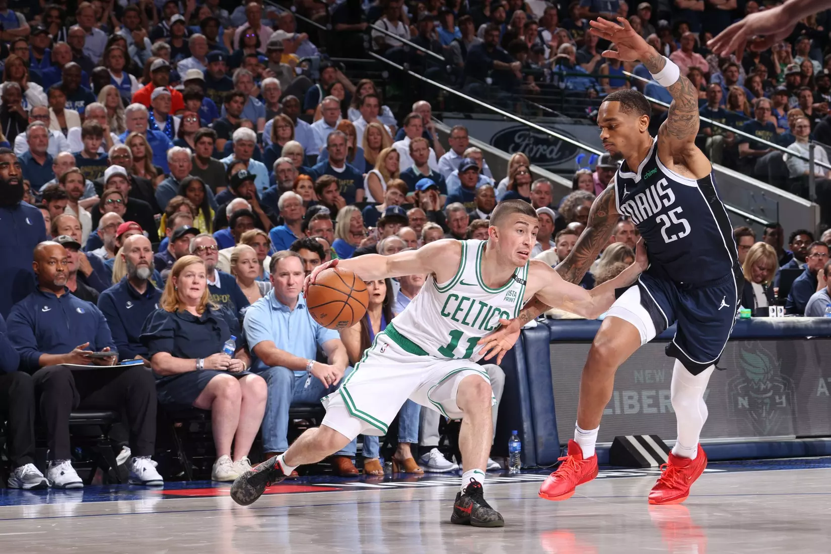 DALLAS, TX - JUNE 12: Payton Pritchard #11 of the Boston Celtics drives to the basket during the game against the Dallas Mavericks during Game 3 of the 2024 NBA Finals on June 12, 2024 at the American Airlines Center in Dallas, Texas. NOTE TO USER: User expressly acknowledges and agrees that, by downloading and or using this photograph, User is consenting to the terms and conditions of the Getty Images License Agreement. Mandatory Copyright Notice: Copyright 2024 NBAE (Photo by Nathaniel S. Butler/NBAE via Getty Images)