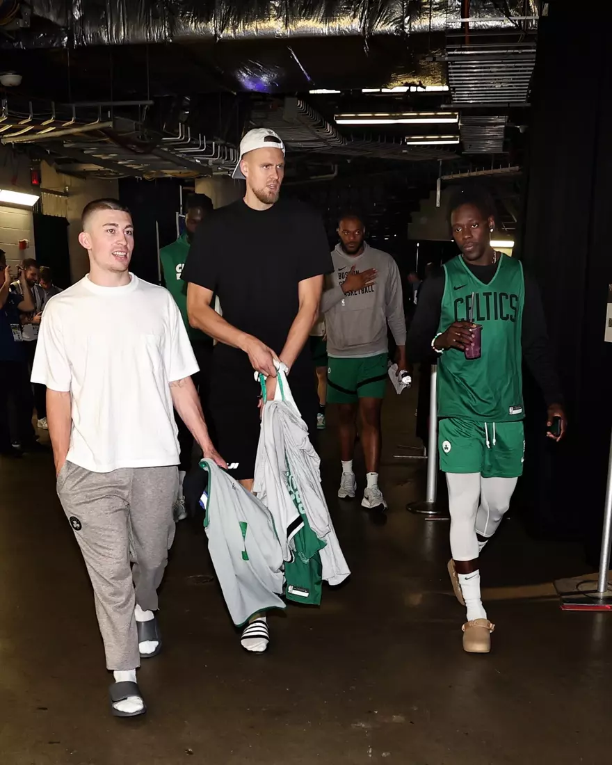 DALLAS, TX - JUNE 13: Payton Pritchard #11 of the Boston Celtics, Kristaps Porzingis #8 of the Boston Celtics, and Jrue Holiday #4 of the Boston Celtics looks on during 2024 NBA Finals Practice and Media Availability on June 13, 2024 at the American Airlines Center in Dallas, Texas. NOTE TO USER: User expressly acknowledges and agrees that, by downloading and or using this photograph, User is consenting to the terms and conditions of the Getty Images License Agreement. Mandatory Copyright Notice: Copyright 2024 NBAE (Photo by Jim Poorten/NBAE via Getty Images)
