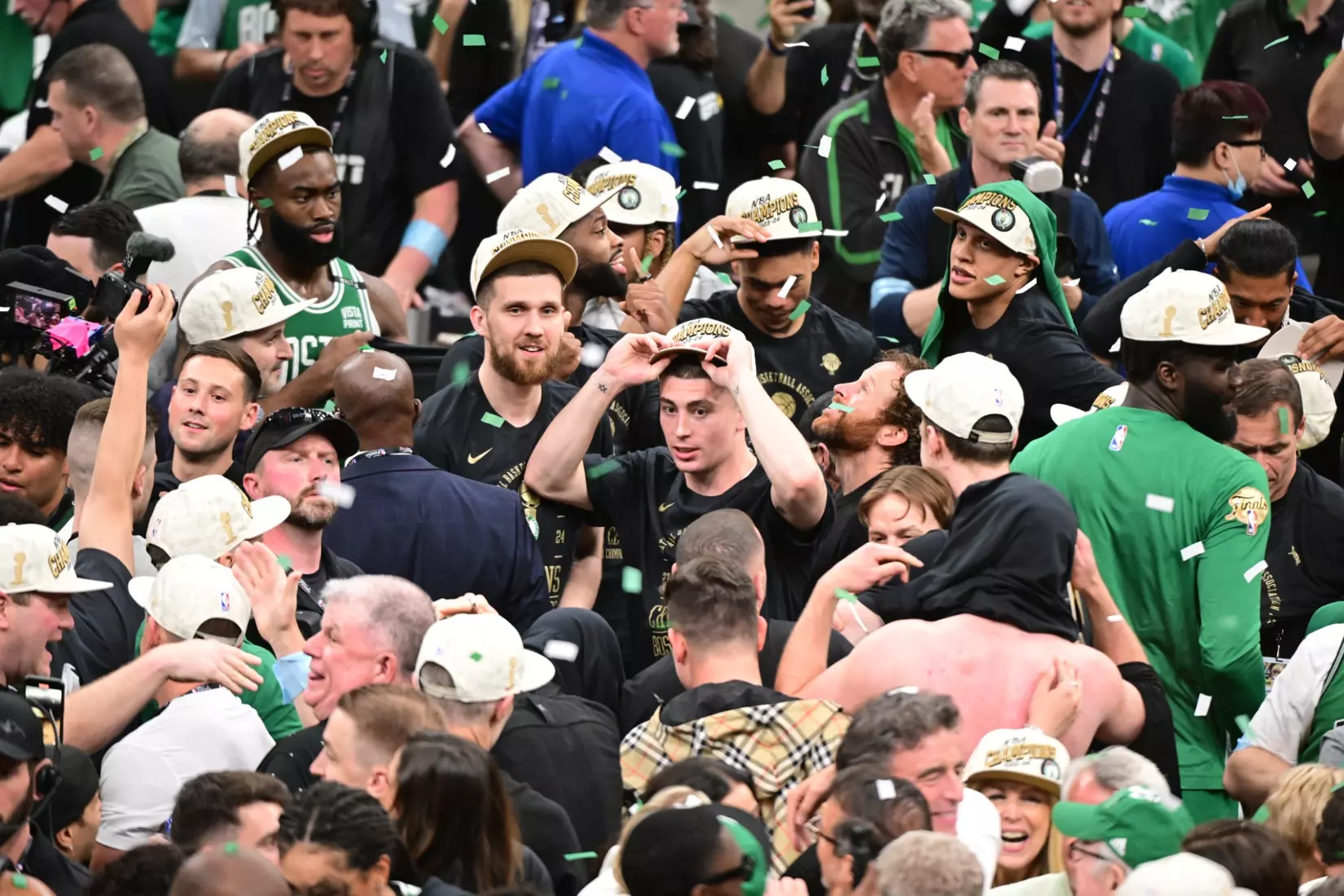 BOSTON, MA - JUNE 17: Payton Pritchard #11 of the Boston Celtics celebrates during the game against the Dallas Mavericks during Game Five of the 2024 NBA Finals on June 17, 2024 at the TD Garden in Boston, Massachusetts.