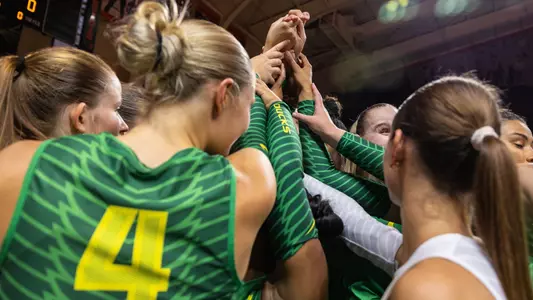 Team huddle at Oregon State exhibition