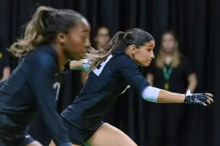 The University of Oregon Ducks Acrobatics and Tumbling team competed against the Quinnipiac University Bobcats in a home meet at Matthew Knight Arena in Eugene, Ore., on March 16, 2024. (Eric Becker/Oregon A&T)