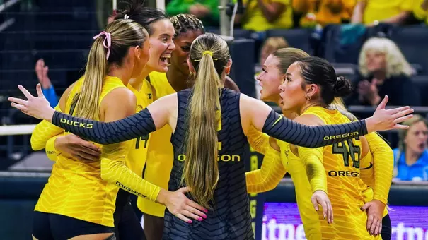 Team huddle, celebration vs Michigan State (Nov. 9)